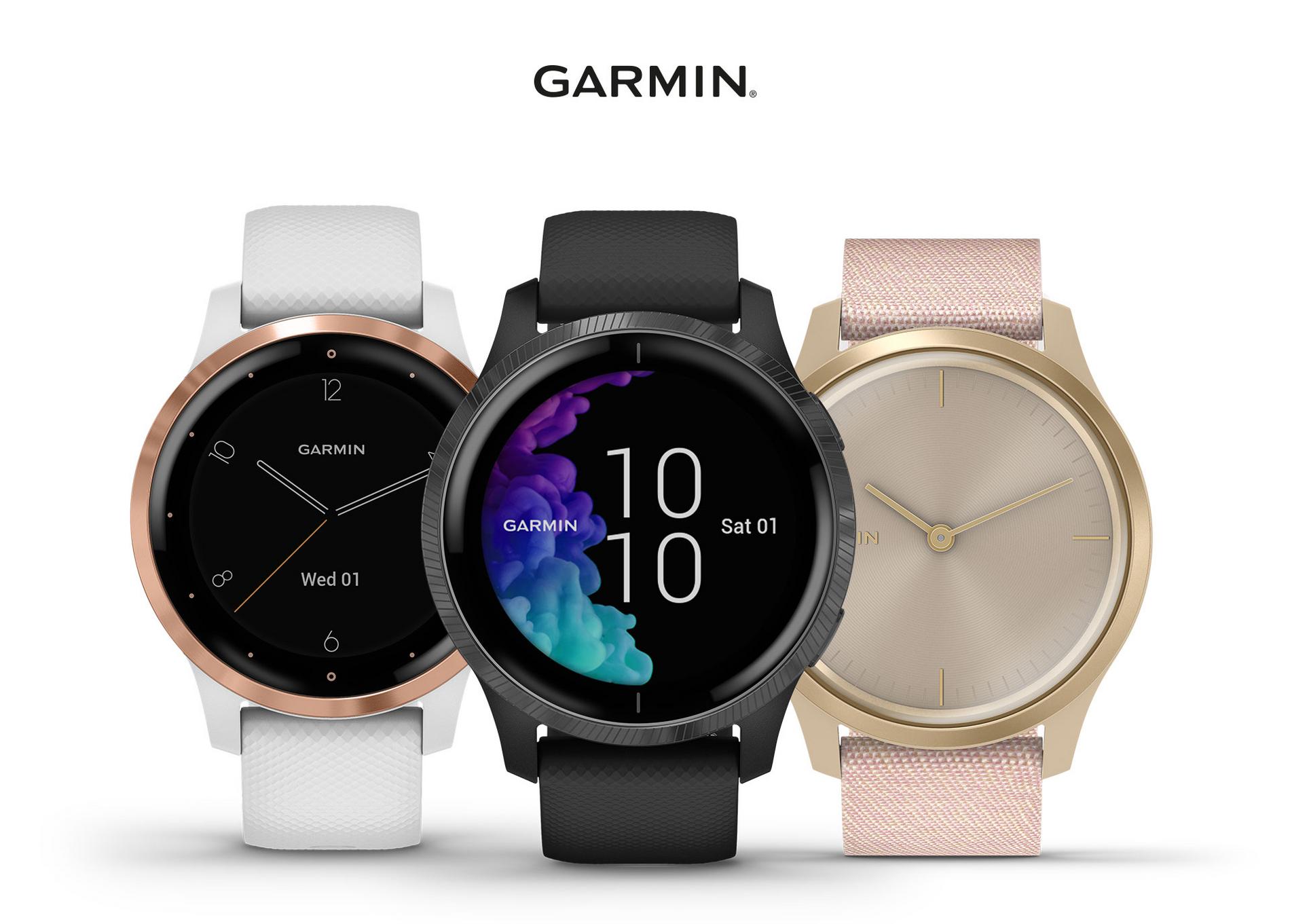 Three coloured Garmin watches on White background